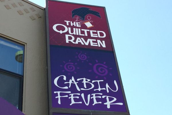 Quilted Raven Sign Face