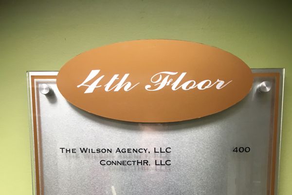 Sign with Copper Oval Header, Clear Face and Brushed Aluminum Backer
