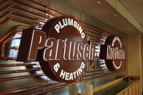 Partusch Plumbing Reception Sign