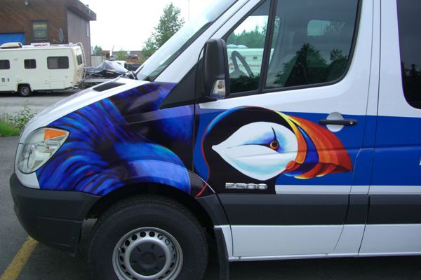 Pinted Logo & Graphics on White Puffin Inn Van